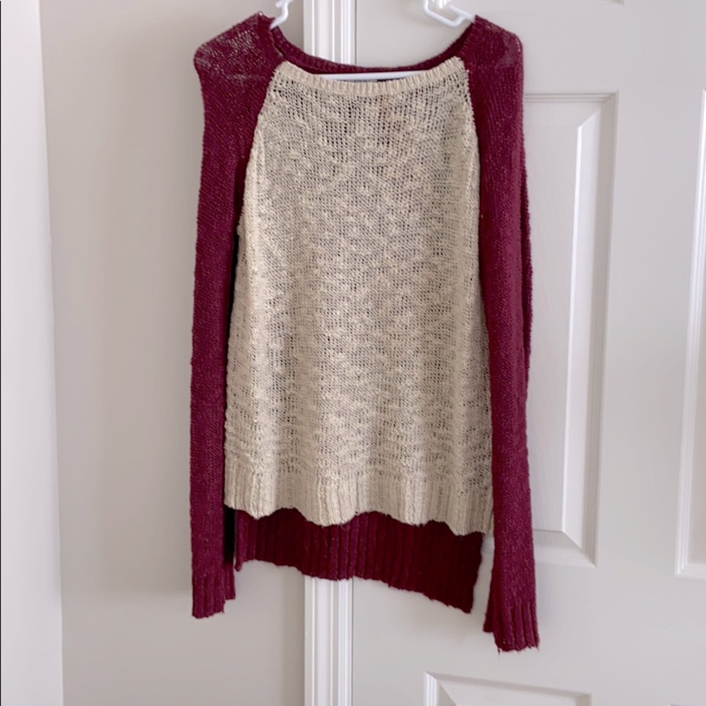 Tan and red sweater